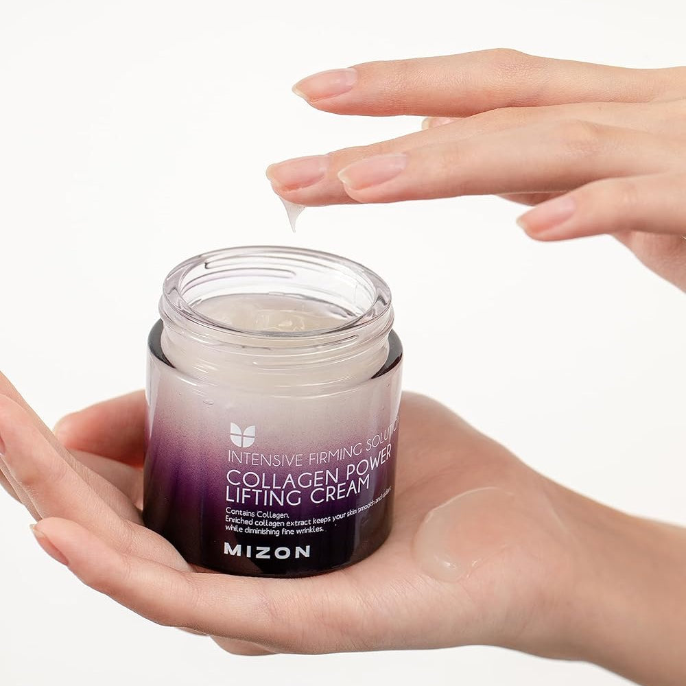 Mizon collagen eye lifting cream jar with a hand applying cream on a white background